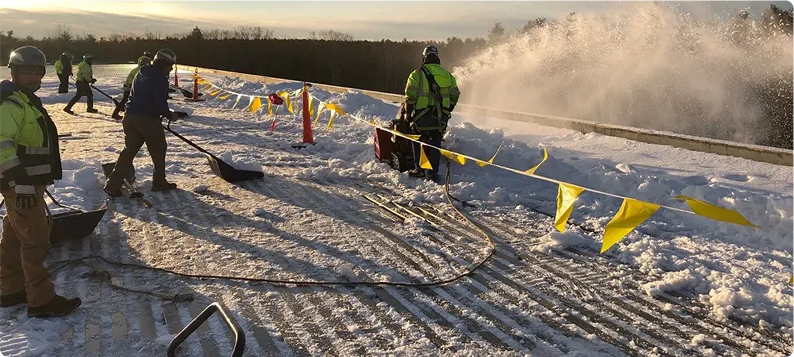 Rooftop Snow Removal & Roof De-Icing Services